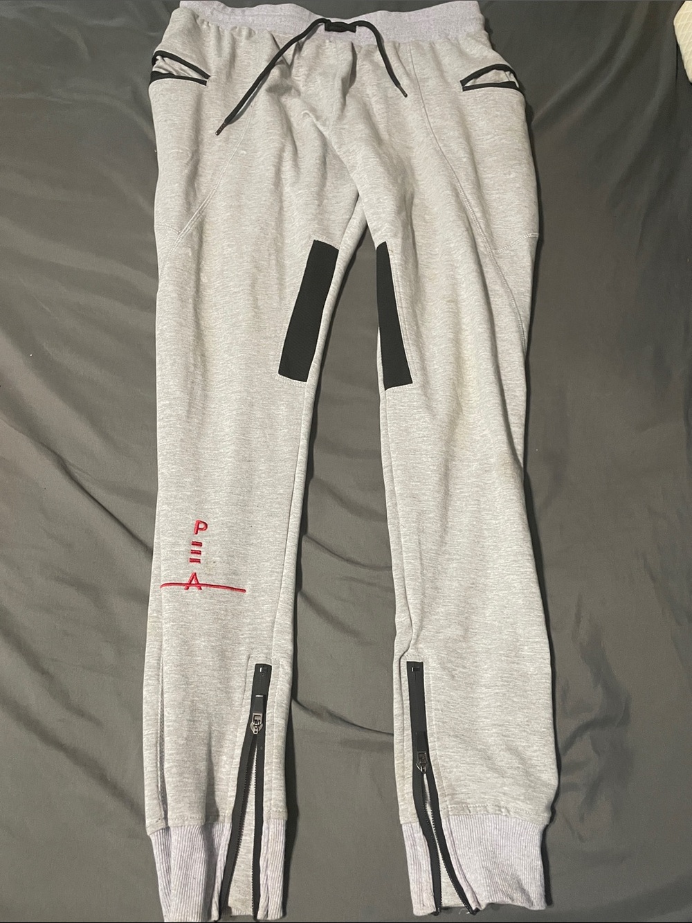 Light Gray Jogger Sweatpants with Black Accents and Red Stitching